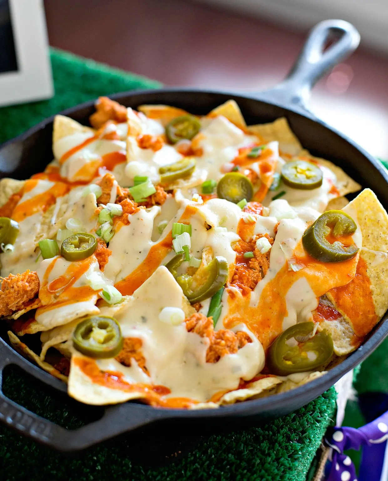 Baked Layered Buffalo Chicken Nachos