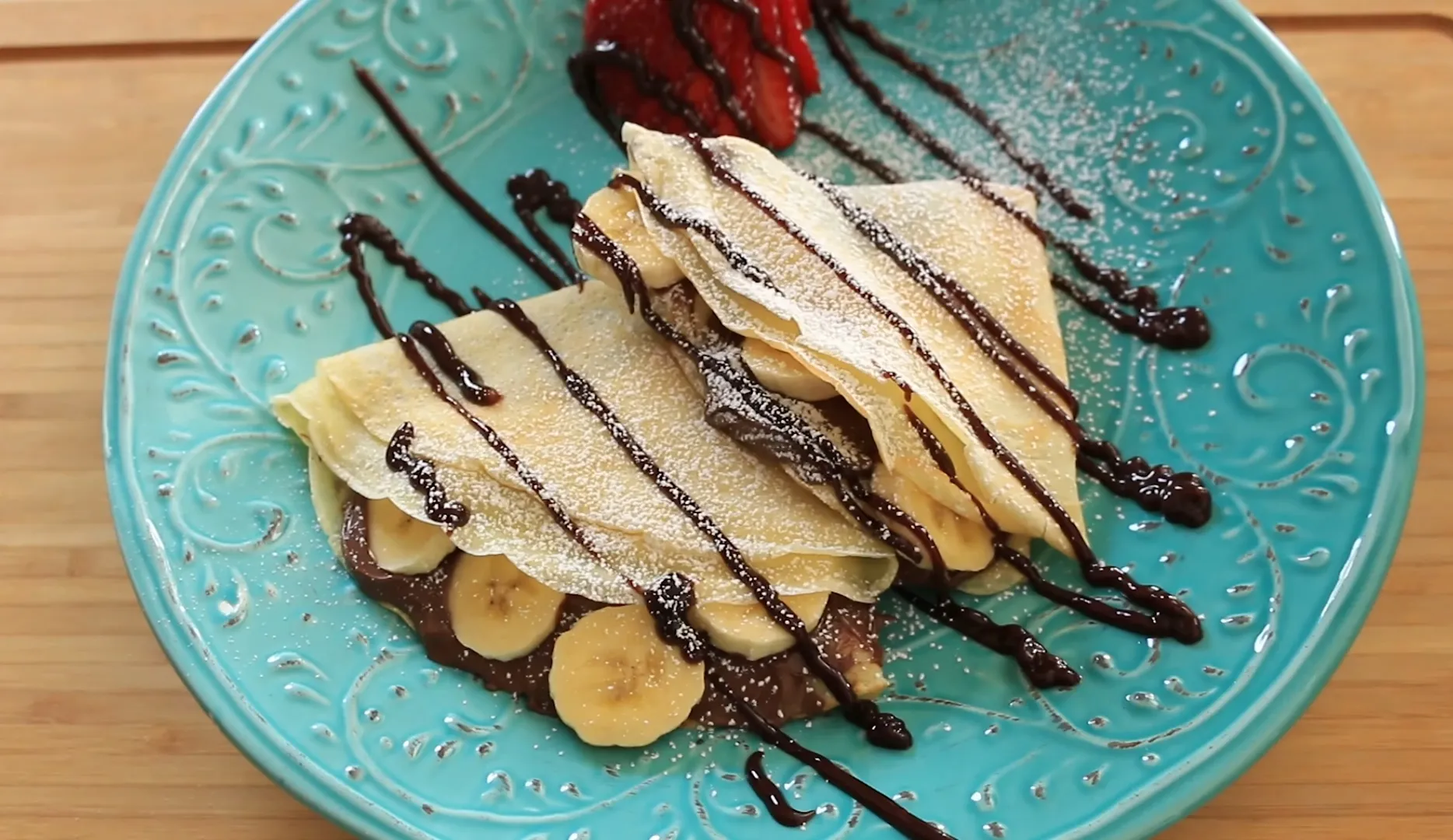 Banana Cinnamon Crepes with Chocolate Pudding and Fresh Fruit