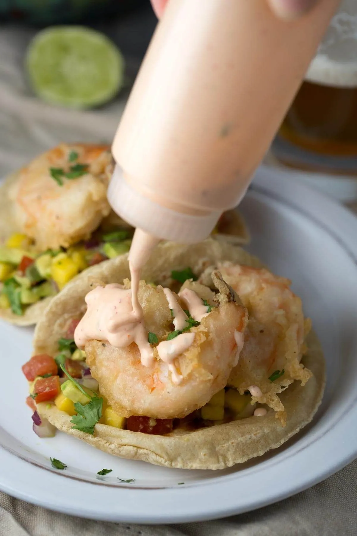 Beer Battered Shrimp Tacos with Mango Salsa and Sriracha Sauce