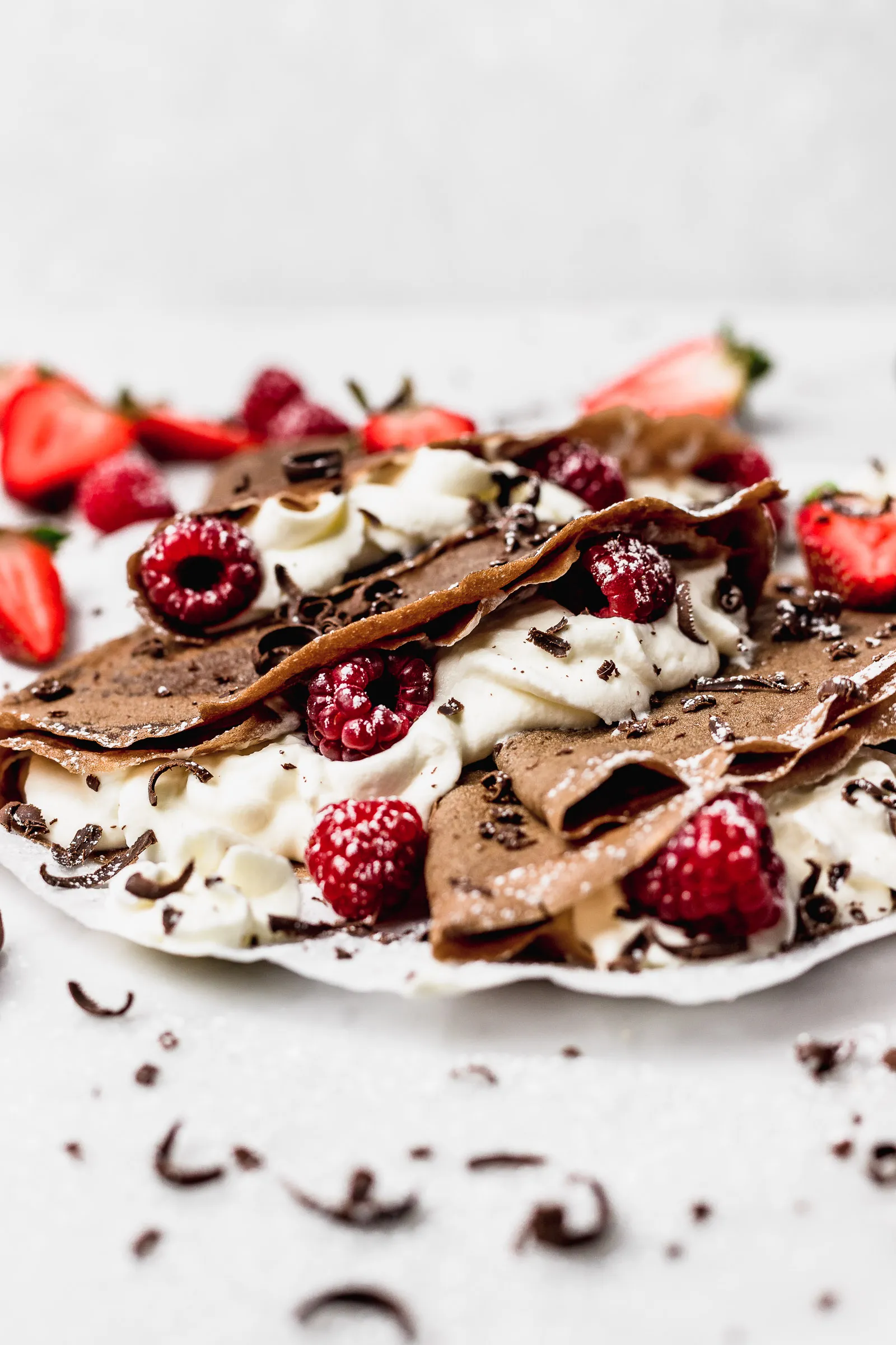 Chocolate Crepes with Cherry Cream Filling and Chocolate Sauce
