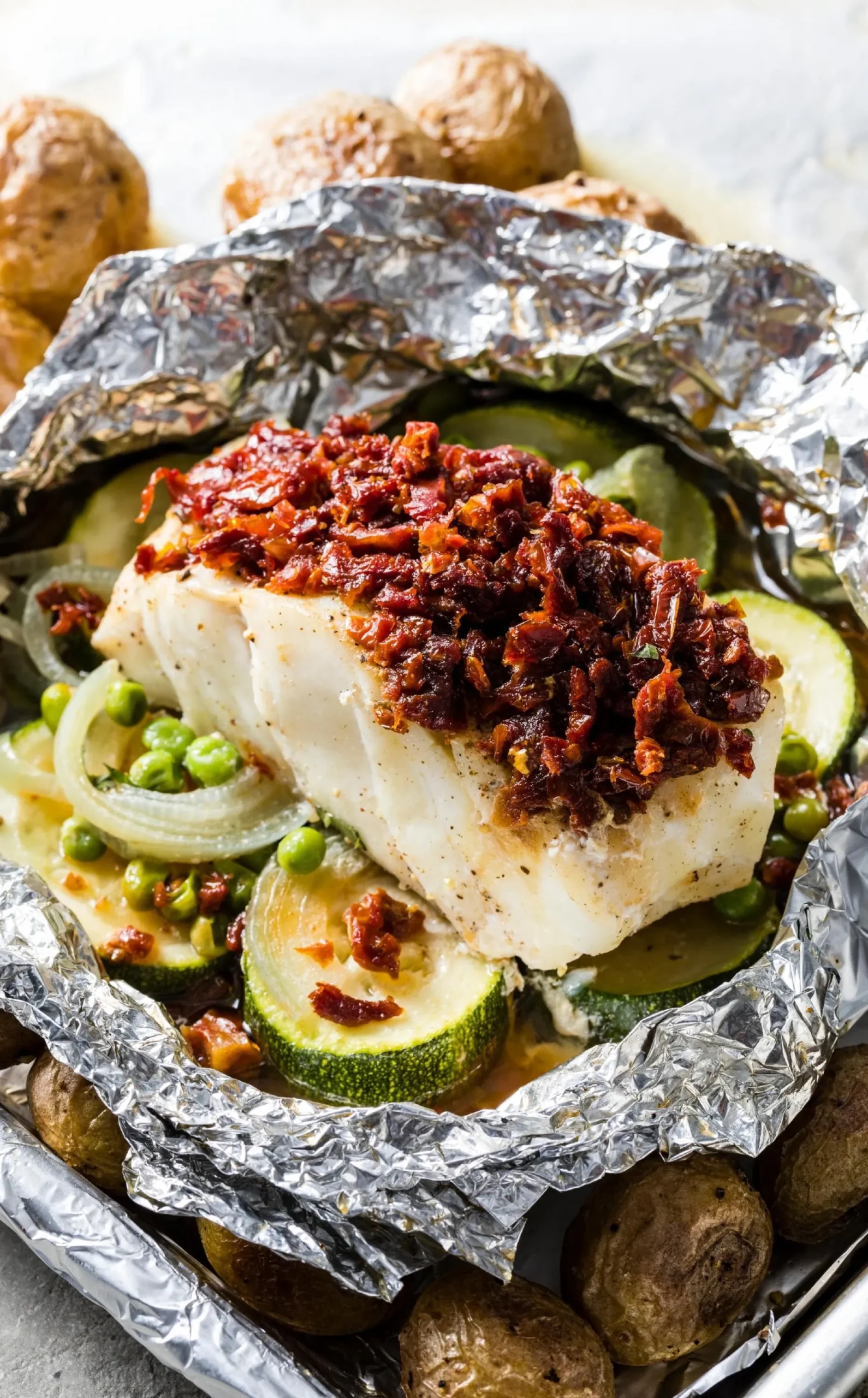 Cod Baked with Zucchini and Tomatoes