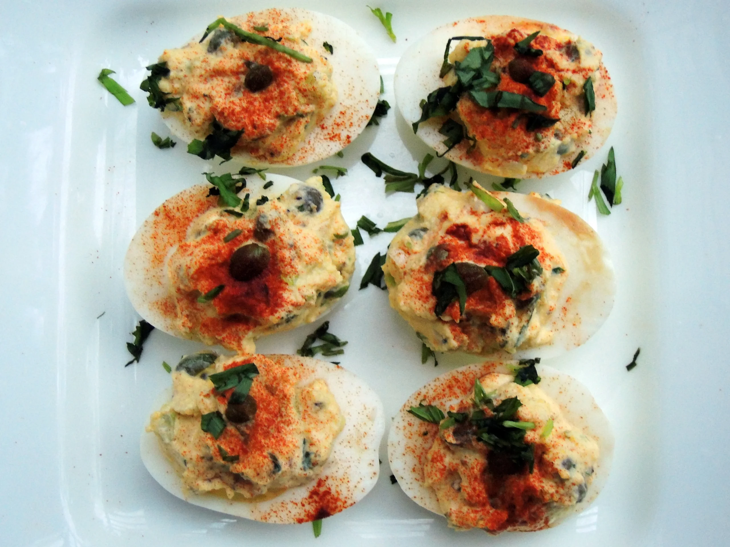 Eggs Stuffed with Capers, Olives, Anchovy and Radish