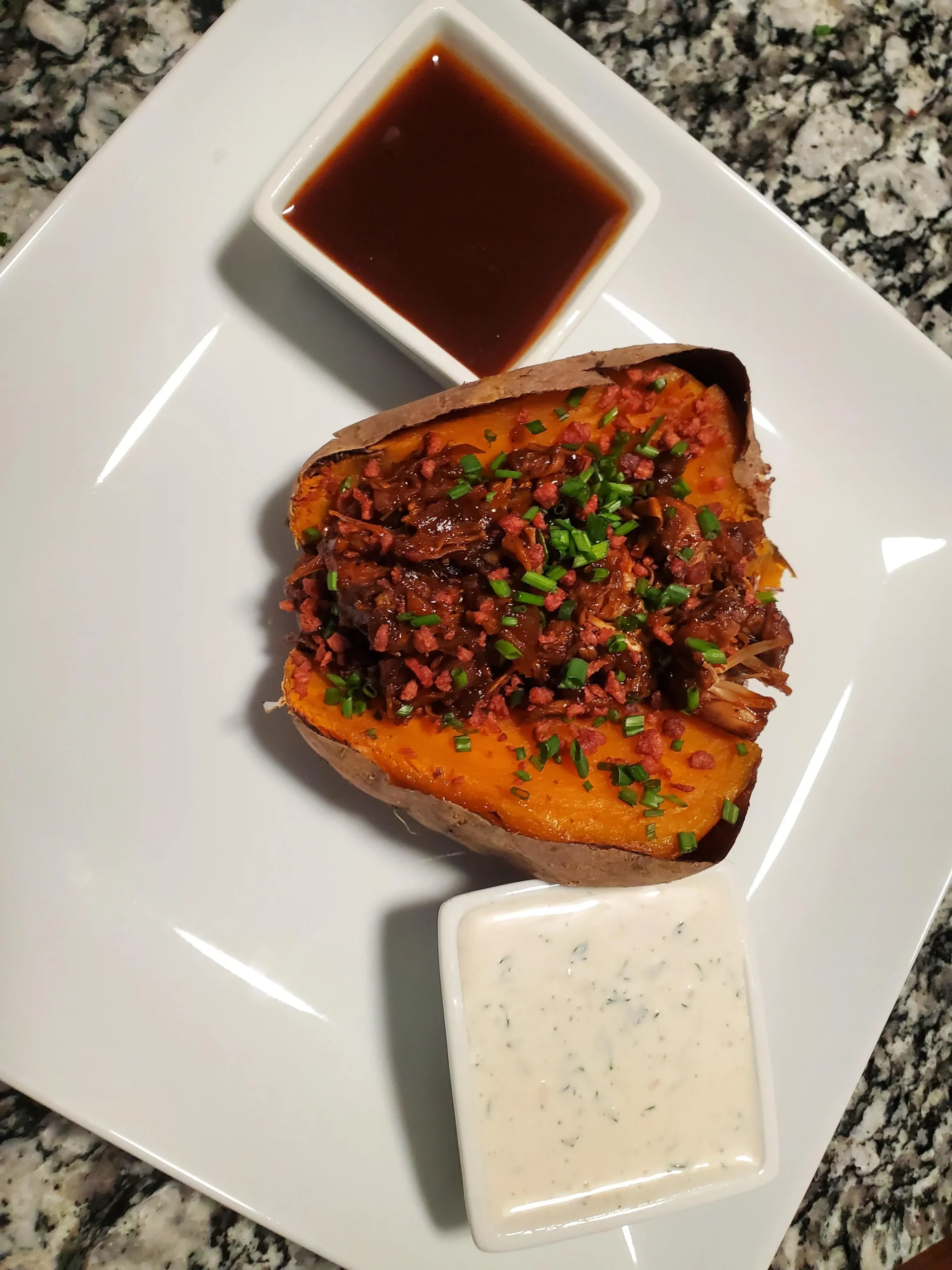 Loaded BBQ Pulled Pork Sweet Potatoes