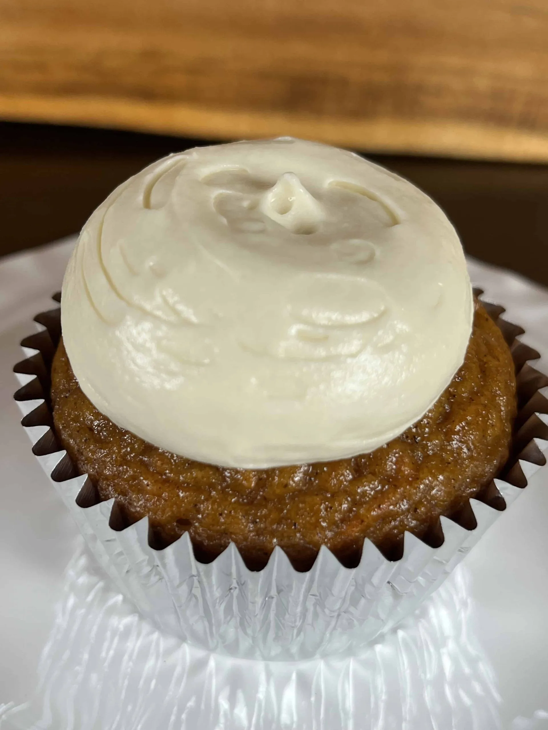 Pumpkin Carrot Cake Cupcakes with Maple Cream Cheese Frosting