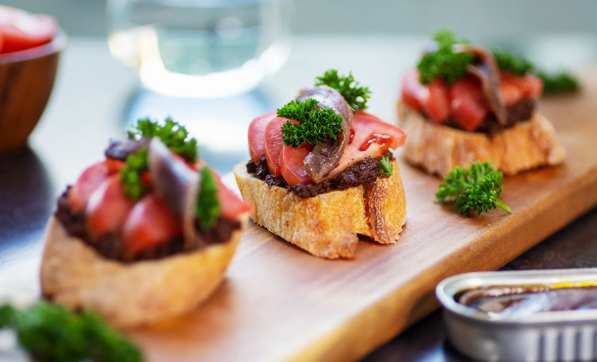 Spanish Montaditos with Black Olive Tapenade and Anchovies