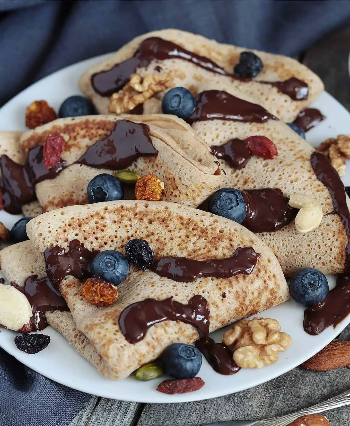 Vegan Crepes with Berry Compote and Chocolate Sauce