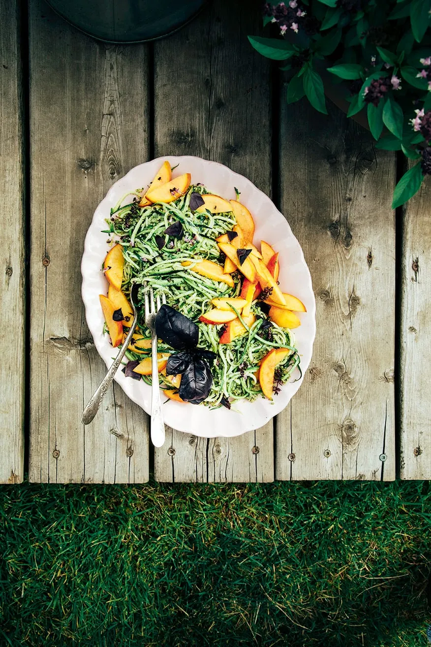Zucchini Spaghetti with Peaches and Pumpkin Seed Pesto