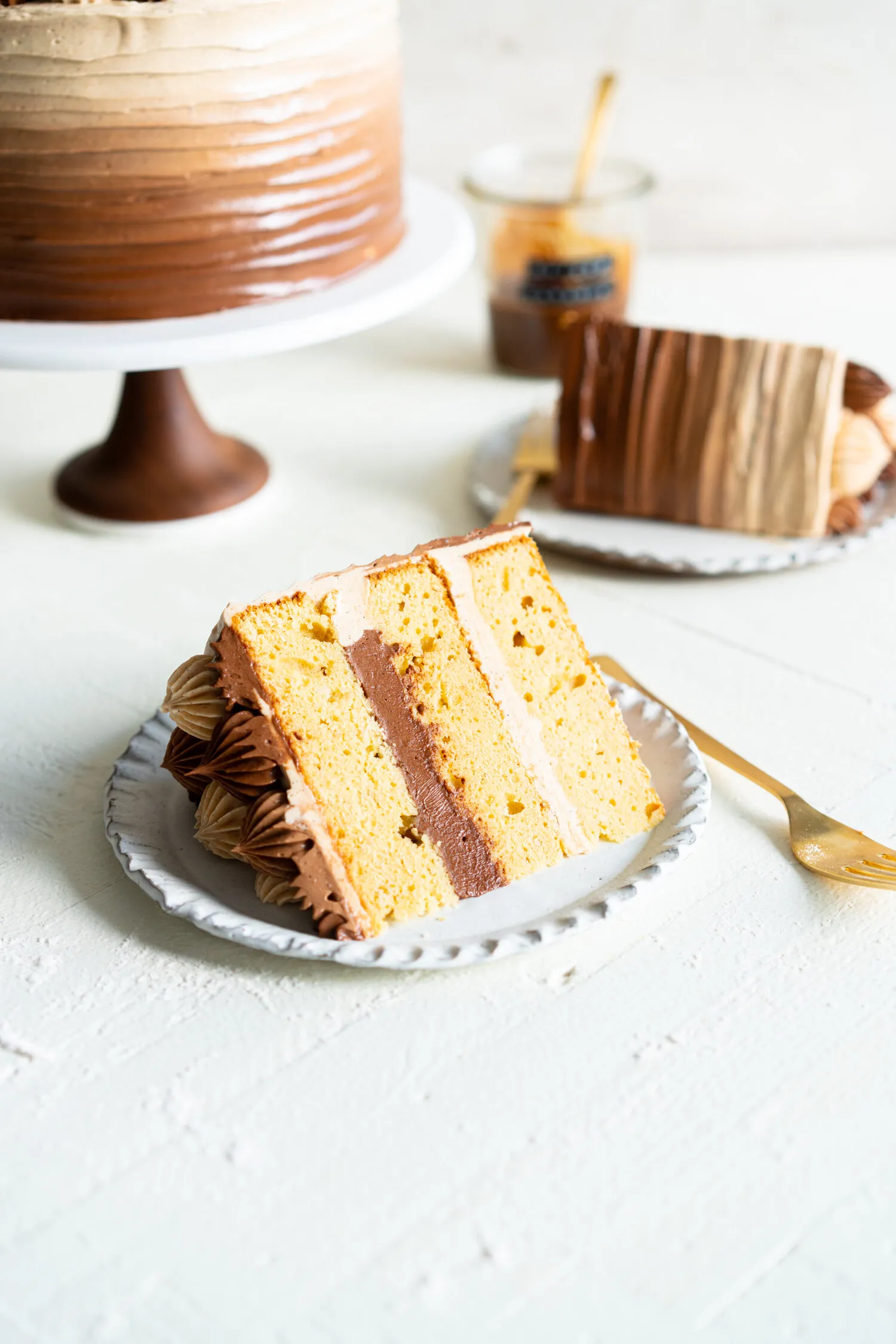 apple cider layer cake with spiced caramel swiss meringue buttercream