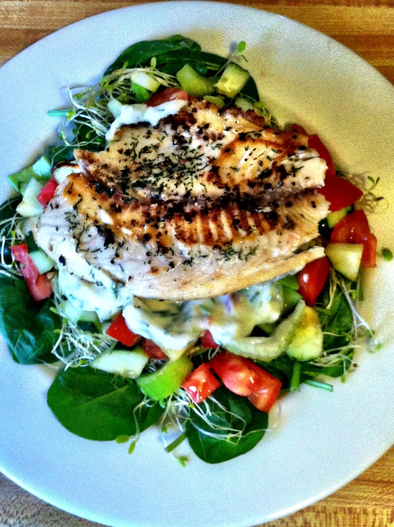 greek tilapia with wilted spinach