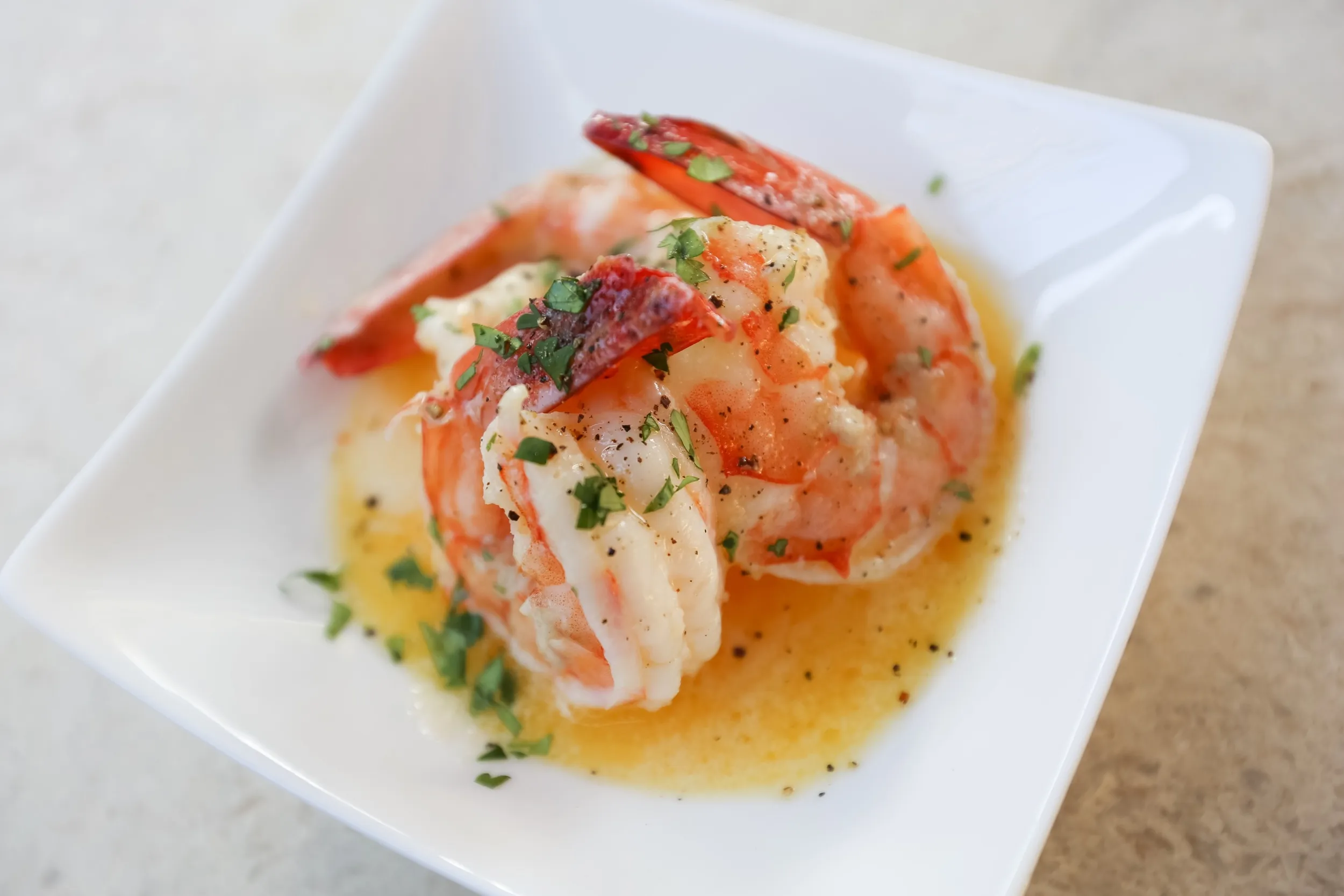 sous vide butter poached shrimp with spaghetti lemon and chives